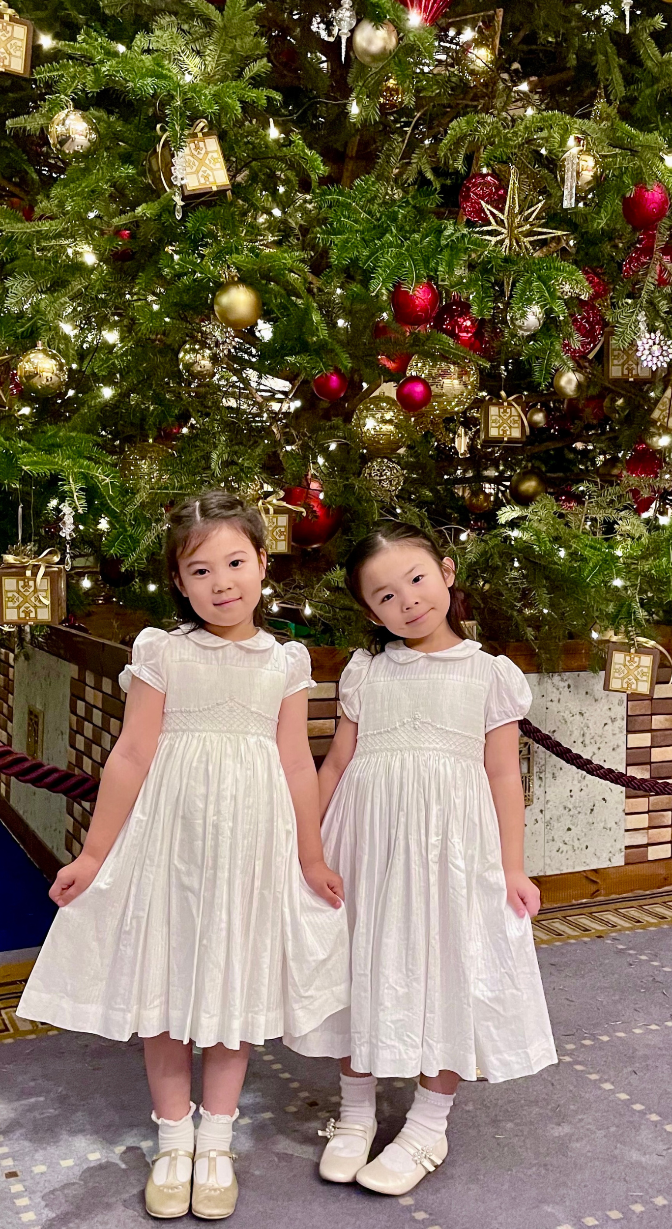 Image Title Charlotte sy Dimby classic timeless traditional smocked dresses for babies and girls handmade French style children clothing paris boutique soft pink striped dress singapour