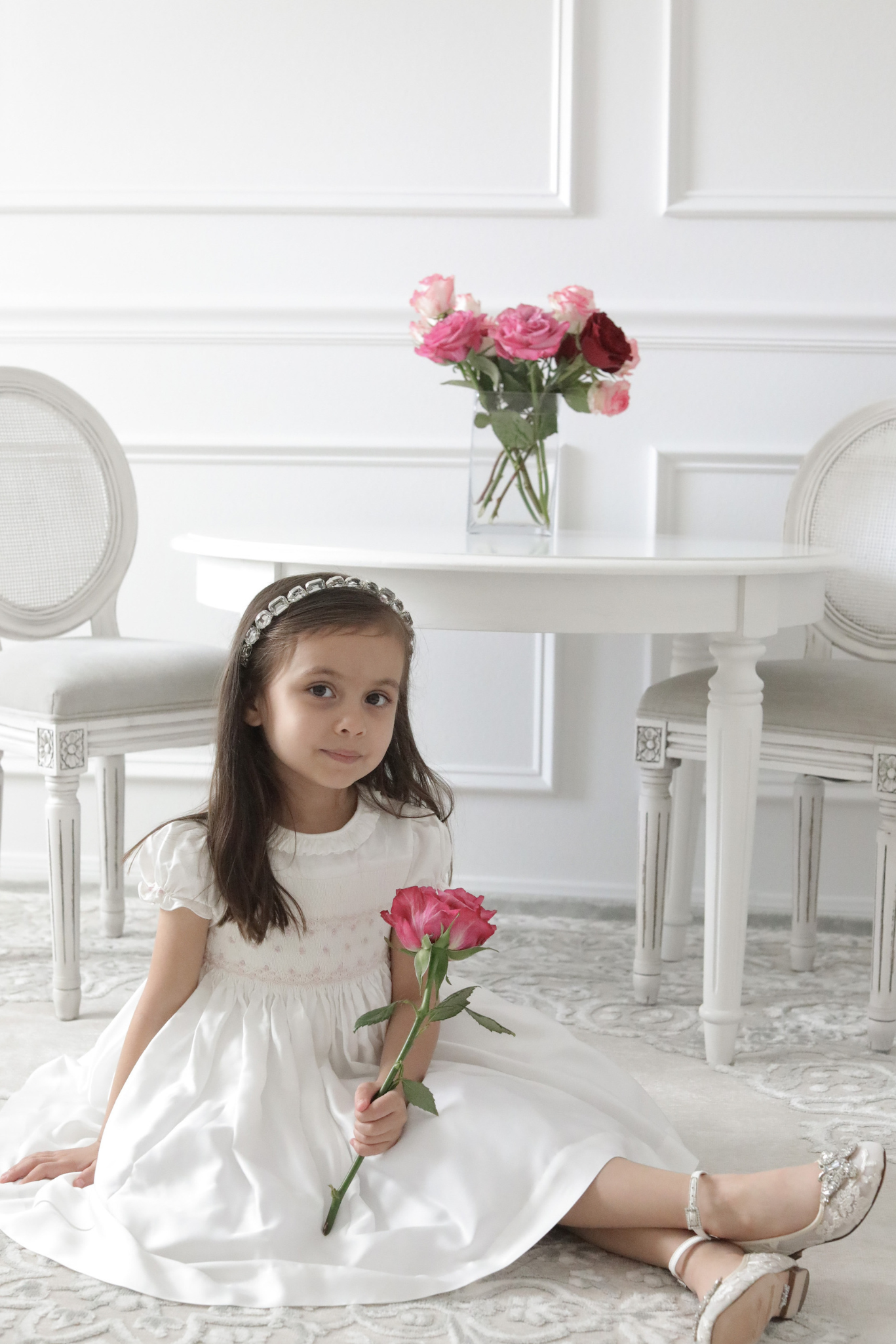 Image Title Charlotte sy Dimby classic timeless traditional smocked dresses for babies and girls handmade French style children clothing paris boutique twirling princess dress white heirloom elegant portrait dress houston texas