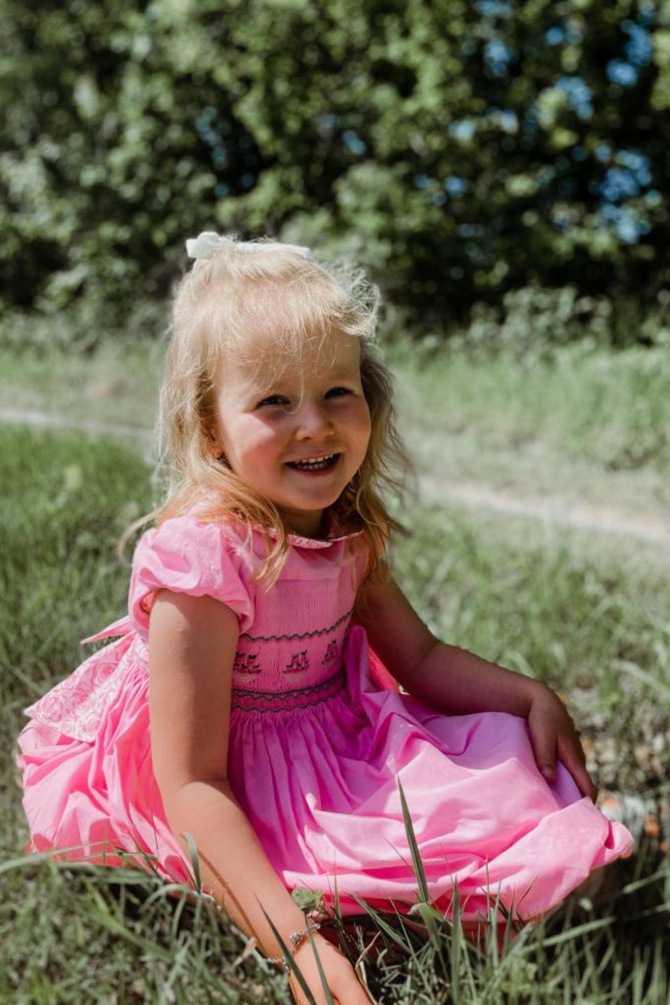 Image Title Charlotte sy Dimby classic timeless traditional smocked dresses for babies and girls handmade French style children clothing paris boutique bright pink high quality netherlands