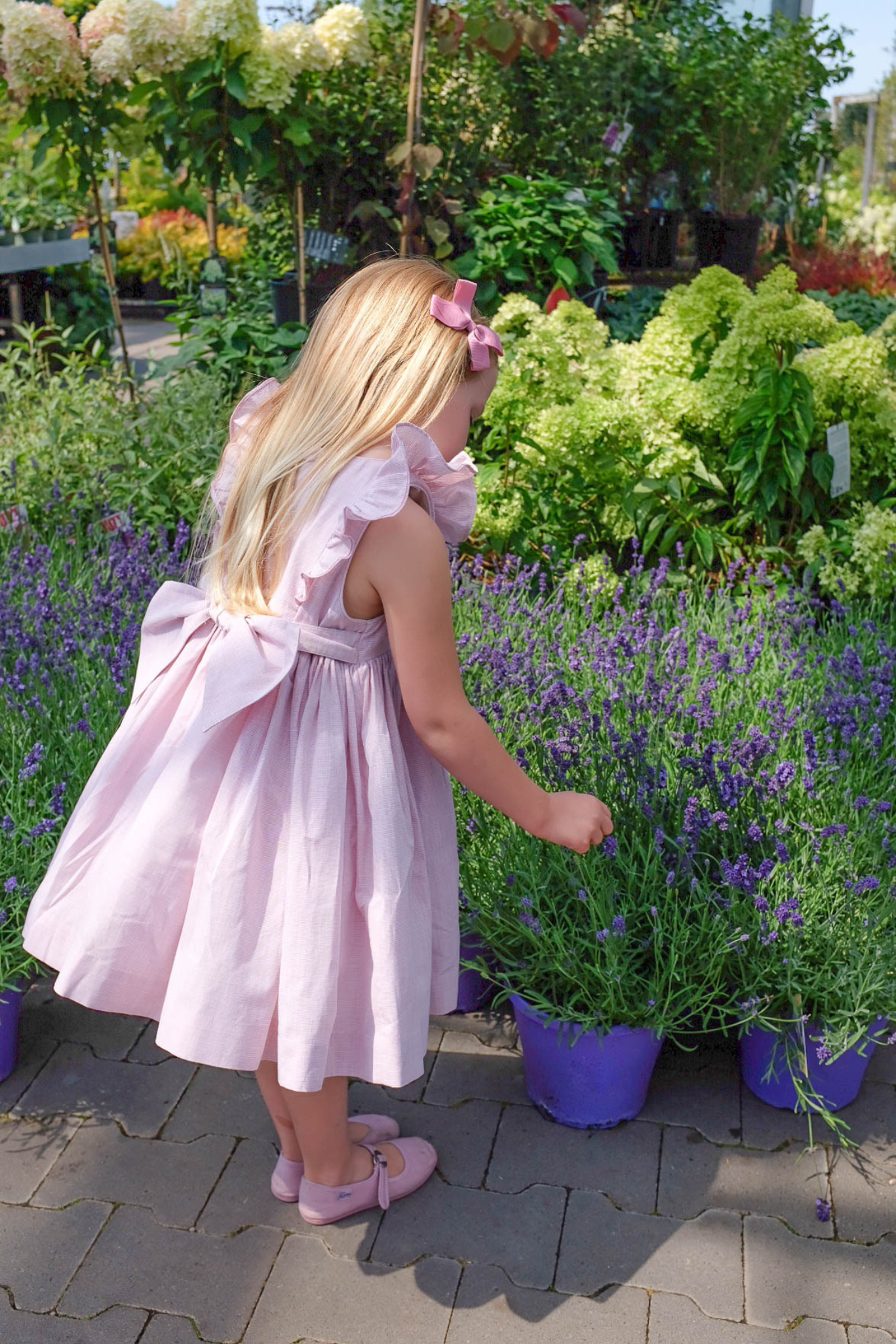 Image Title Charlotte sy Dimby classic timeless traditional smocked dresses for babies and girls handmade French style children clothing paris boutique twirling princess dress white heirloom elegant portrait dress soft pink ruffles netherlands
