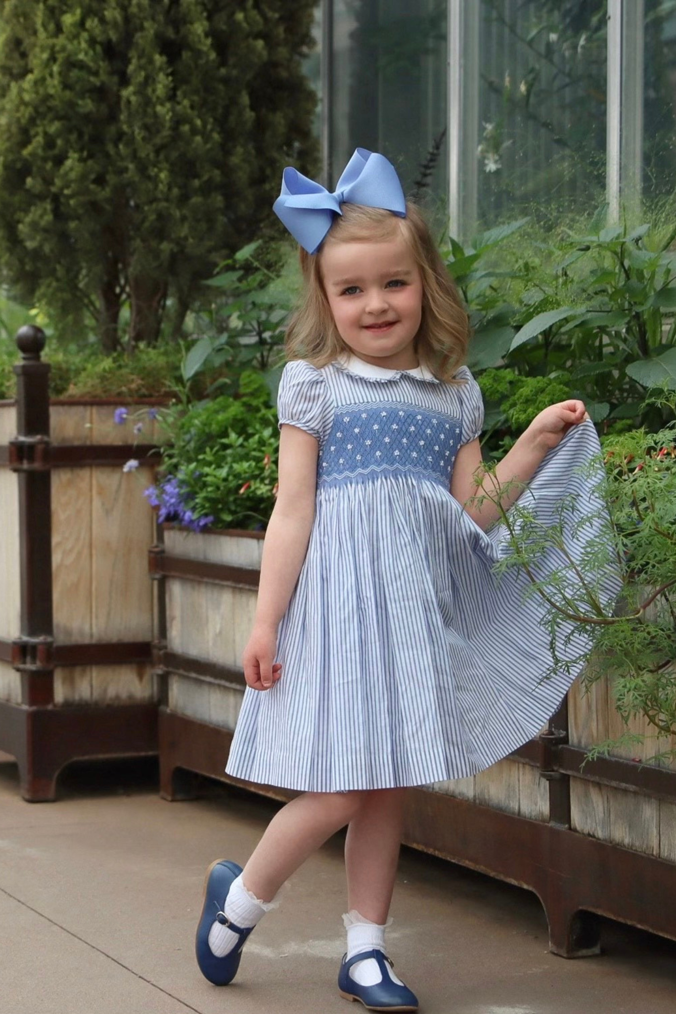 Image Title Charlotte sy Dimby classic timeless traditional smocked dresses for babies and girls handmade French style children clothing paris boutique blue striped heirloom dress colorado