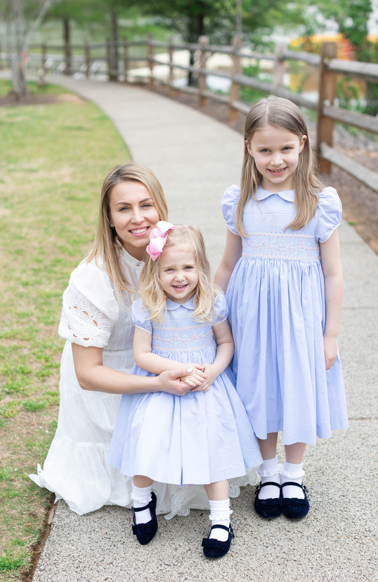 Image Title Charlotte sy Dimby classic timeless traditional smocked dresses for babies and girls handmade French style children clothing paris boutique pastel blue children photography heirloom twirl dress georgia mother's day