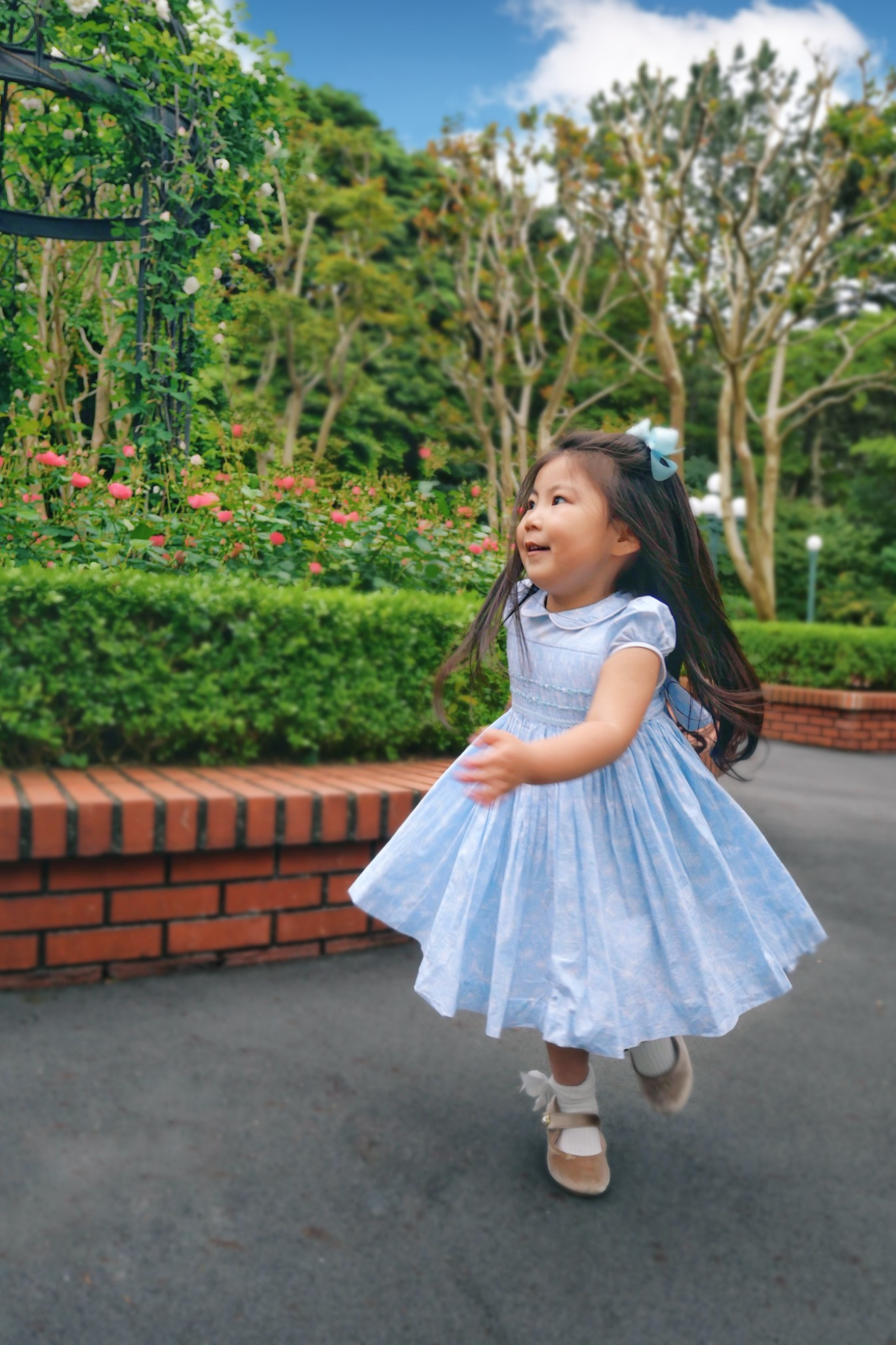 Image Title Charlotte sy Dimby classic timeless traditional smocked dresses for babies and girls handmade French style children clothing paris boutique twirling princess dress japan tokyo pastel blue