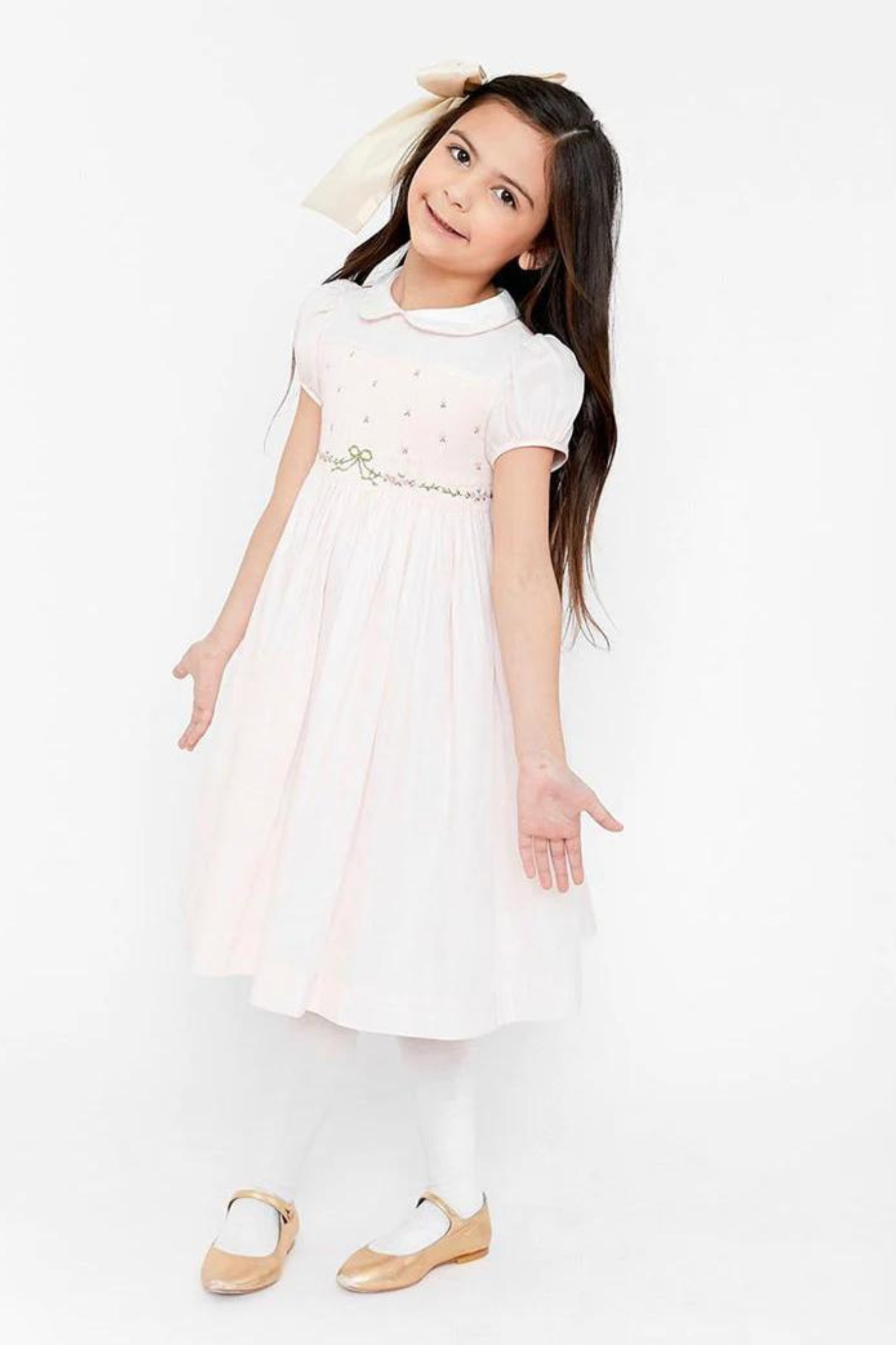 Image Title Charlotte sy Dimby classic timeless traditional smocked dresses for babies and girls handmade French style children clothing paris boutique twirling princess dress new york pastel pink bow dress